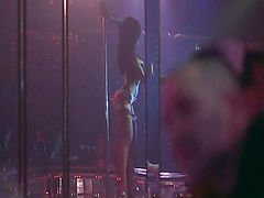 Sarah Shahi seen in bra and panties as she does a sexy dance on stage at a strip club while a guy watches. Meanwhile, we see Lynn Collins giving another guy a lap dance, wearing a blonde wig for part of it. FromThe Dog Problem.