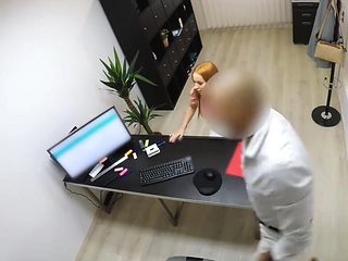 A pale redhead needs the money from the local bank