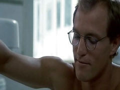 Demi Moore's breasts on display in a hot sex scene with a guy on the floor of a kitchen, Demi showing plenty of cleavage in a black bra before the guy pulls it up and sucks on her left nipple. We then see some quick cuts of Demi's bare butt before she end