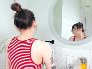 Shower passion session featuring a horny girl who cums