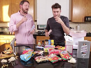 Video of two dudes making and eating food in the kitche...