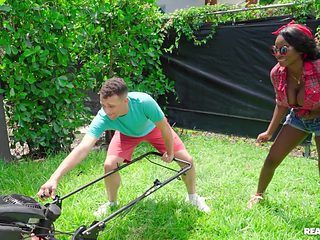 Busty black babe gets laid with the young gardener