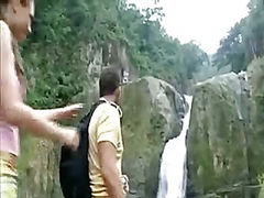 Brunette babe sucks and fucks his hard cock in the great outdoors