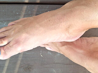 Showing off my new pedicure and stroking my cock