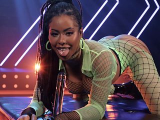 Kira Noir wearing fishnet lingerie sucking a big black ...