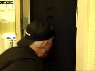 Gloryhole BJ DILF sucks besides open door of toilet