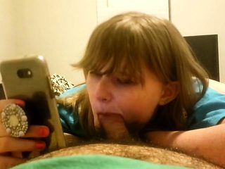 Sucking his dick while browsing Reddit