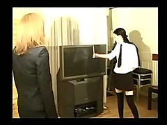 Student is bent over and spankied for not doing her work right