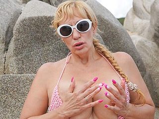 Tattooed girlfriend Victoria Vance is touching her tigh...