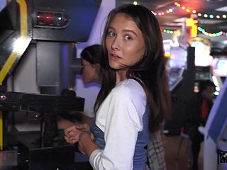 Charming teen goes wild in game hall