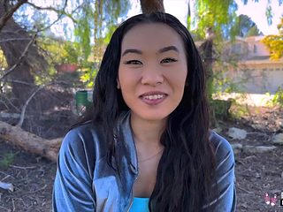 Asian teen likes showing herself outdoors!