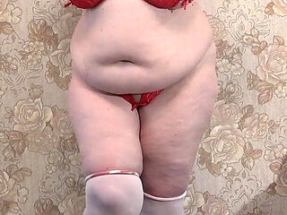 A Mature Wife Is Getting Ready for a Christmas Party an...