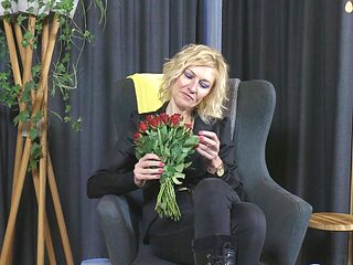 Mature blonde Peggy seductively strokes her juicy, bald...